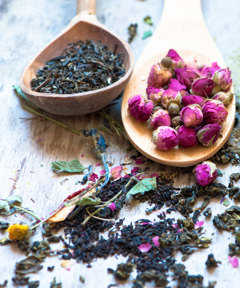 A spoons with dried flowers and leaves